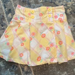 Girls Carter’s pleated skirt with attached shorts